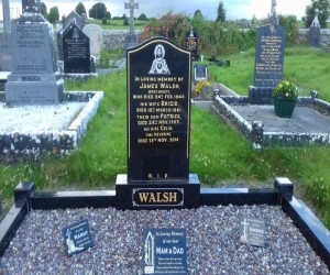 Old black headstone with new base base, kerbs 4 posts
